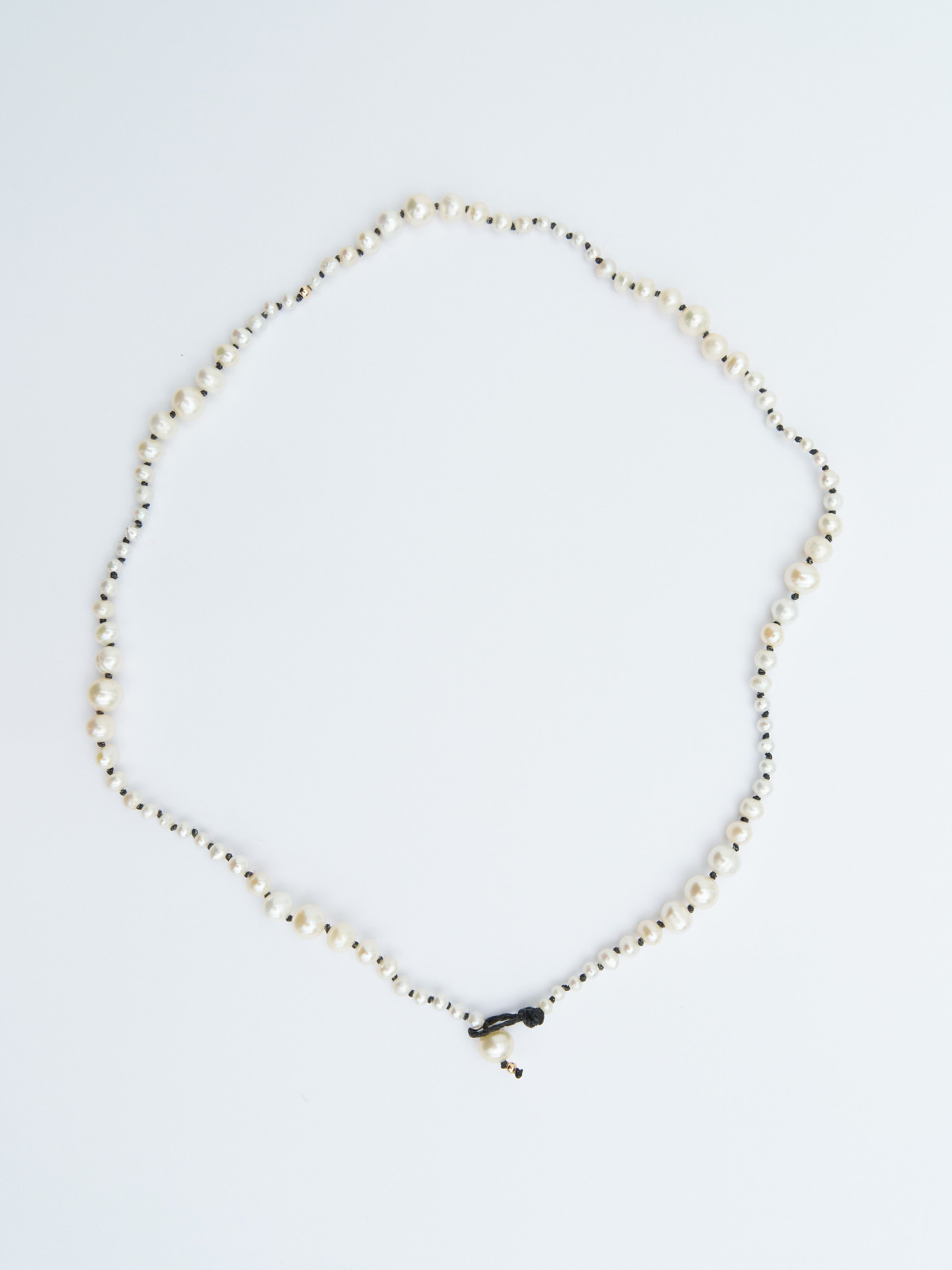 MARICHELLE / PETIT PEARL NECKLACE, BLACK CORD